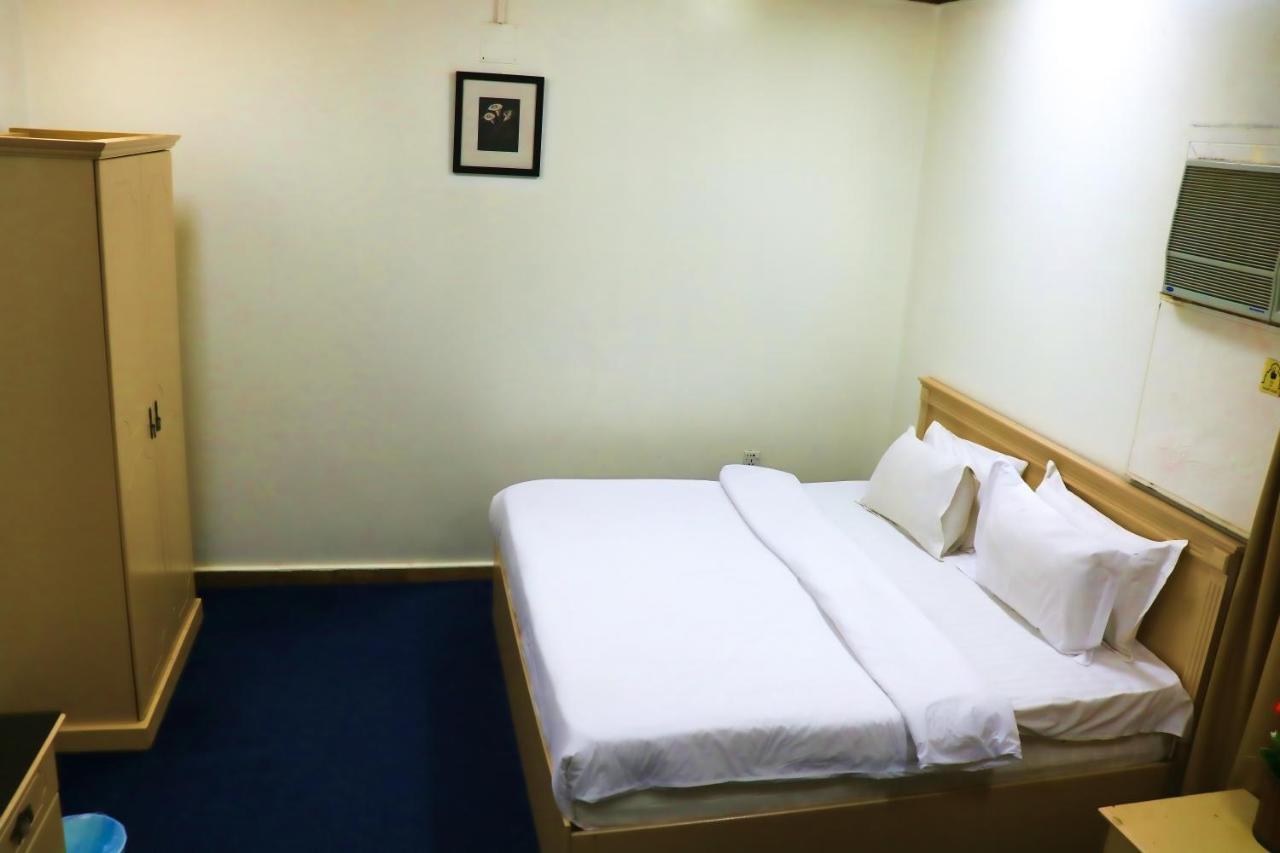Al Farhan Hotel Suites リヤード エクステリア 写真